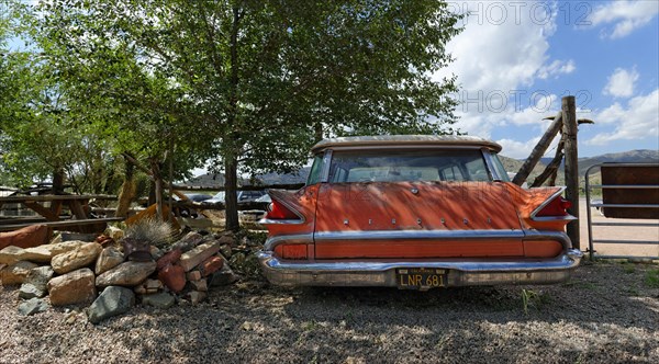 Old red Ford Mercury Commuter 1959