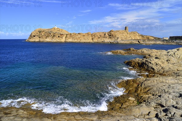 Island Ile de la Pietra with the lighthouse and the Genoese tower