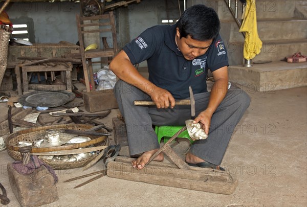 Silversmith creating jewellery