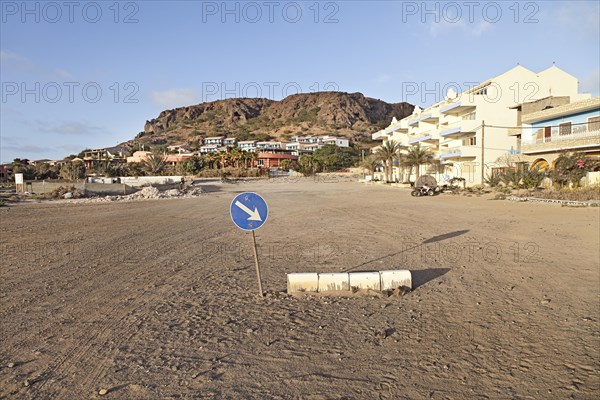 Traffic sign on a unpaved road