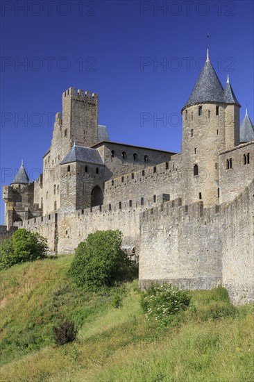 Towers and entrance gate Port d'Aude of the medieval fortress of Carcassonne