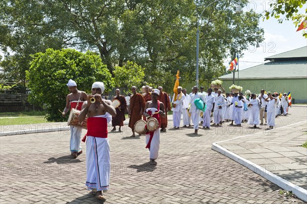 Buddhist pilgrims in a procession with music