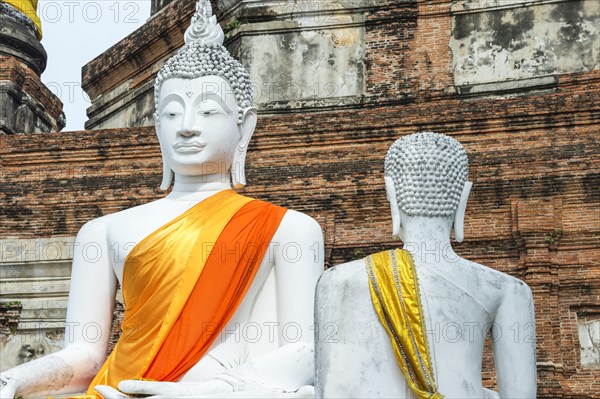 Buddha statues in front of the stupa at Wat Yai Chai Mongkhon