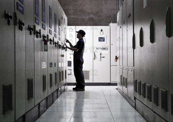 Technicians in the electrical distribution room