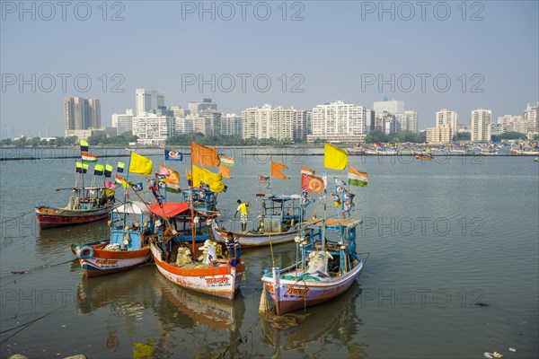 The skyline of the suburb Churchgate seen across the Back Bay with some fishing boats