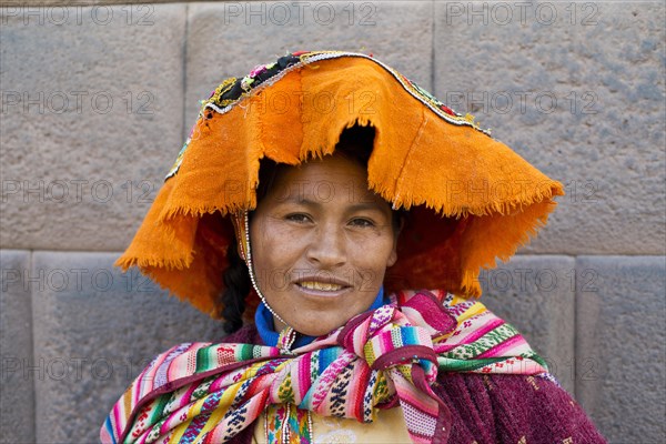 Smiling woman with headscarf and sling