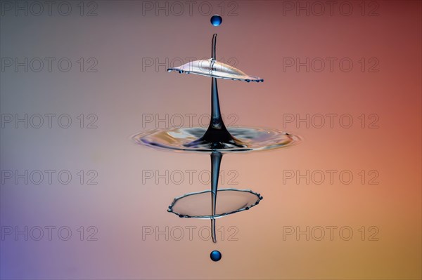 Three drops collide