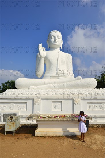 Buddha statue in the lotus position in the Buddhist monastery of Mihintale