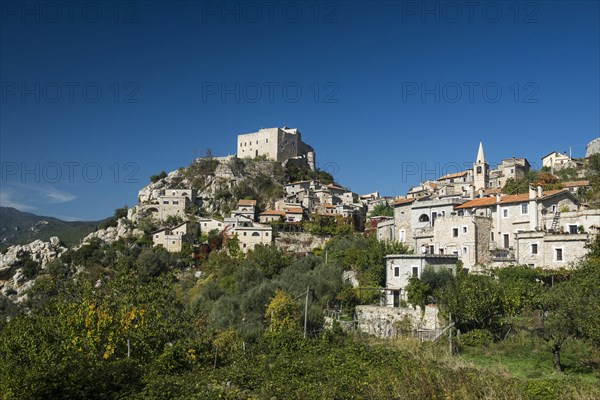 Medieval village with a castle in the mountains