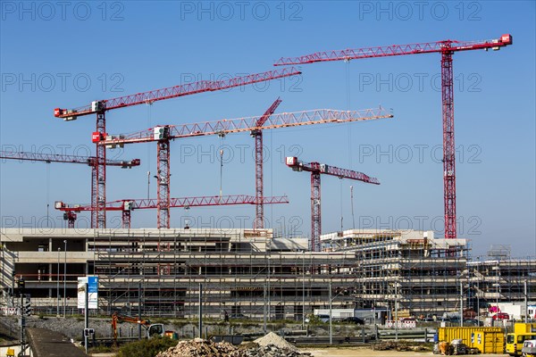 Construction cranes at a construction site