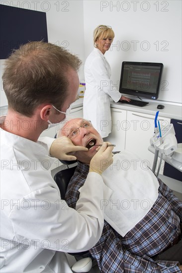 Senior man at the dentist