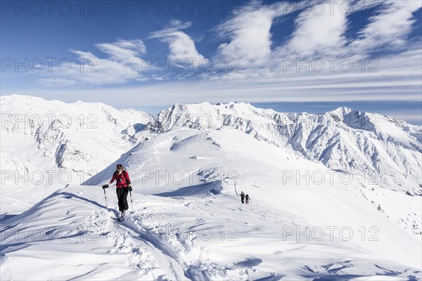 Ski hiker on the summit ridge of the Stotz at Kurzras in the Schnalstal