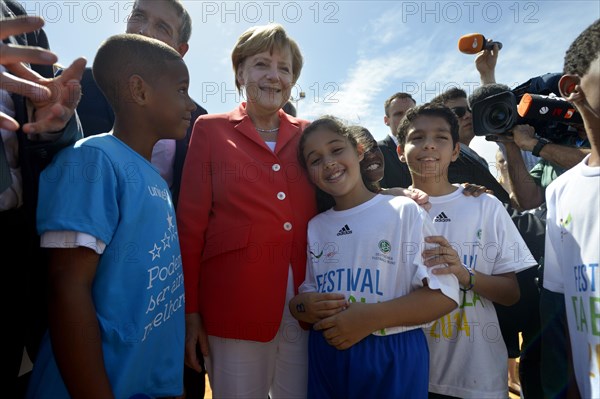 German Chancellor Angela Merkel visiting a social project for children and adolescents run by the German Society for International Cooperation