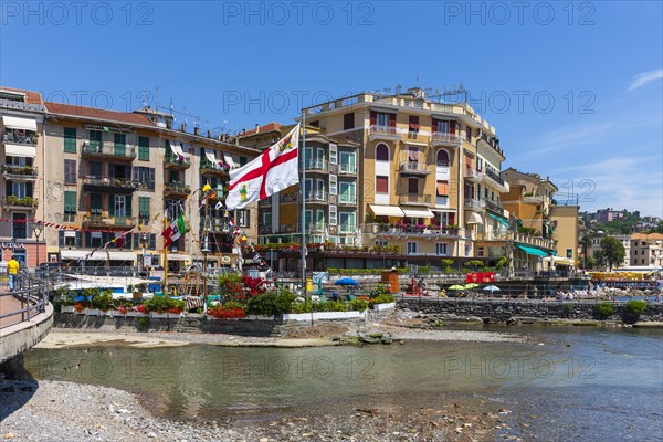 Hotels and sidewalk cafes on the Lungomare Vittorio Veneto at the port of Rapallo