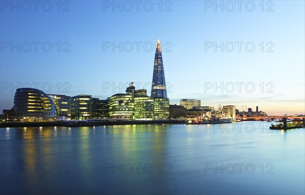 Skyline with City Hall and The Shard with Themse at dusk