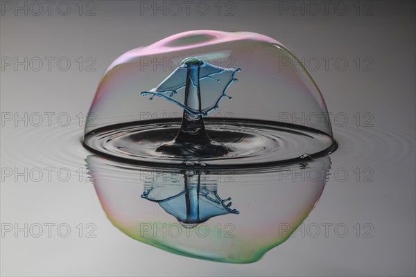 Three drops collide