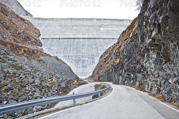 Road at the largest concrete dam in Switzerland