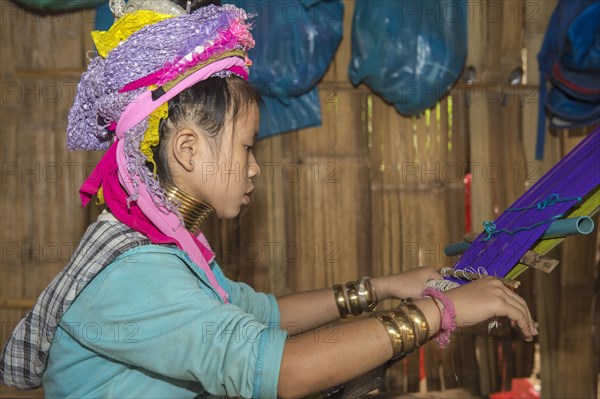 Karen girl weaving