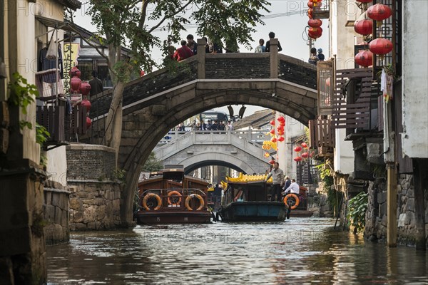 Bridge over a waterway with boats