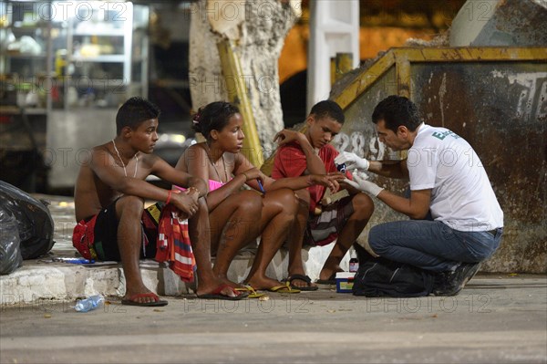 Social worker supporting street children