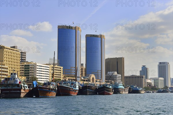 Dhows on the banks of Dubai Creek