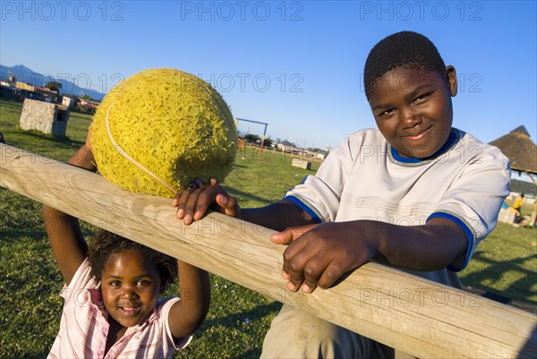 Boy and a girl with a ball