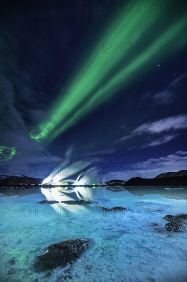 Geothermal plant with the Northern Lights at night