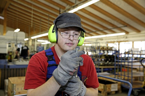 Man with Down syndrome at work