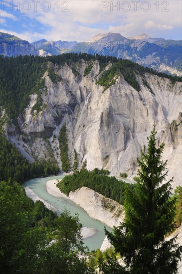 Limestone cliffs at a river bend of the Vorderrhein