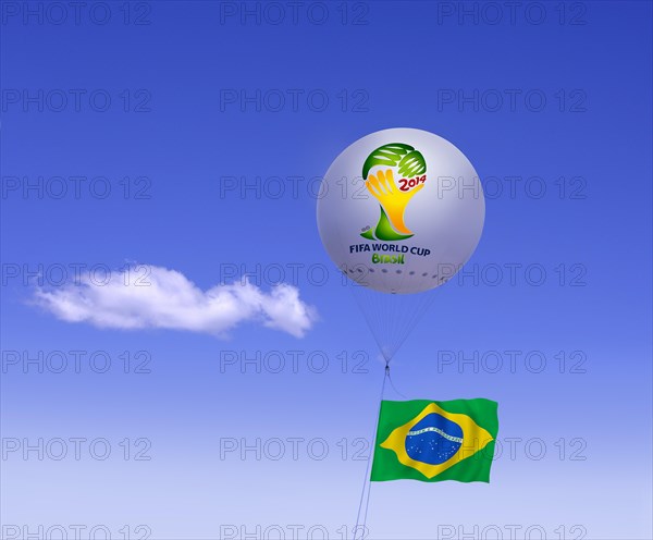 Logo of FIFA World Cup Brazil on moored balloon and Brazilian flag