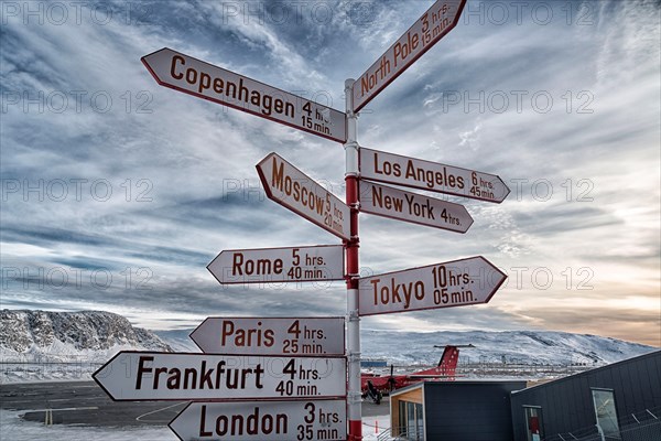 Guide with distances of international cities at the airport of Kangerlussuaq