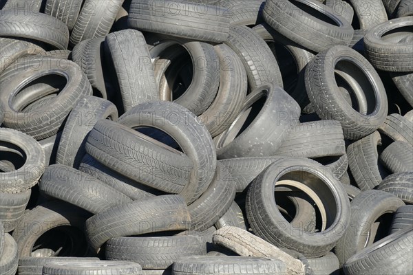 Old car tires in a heap