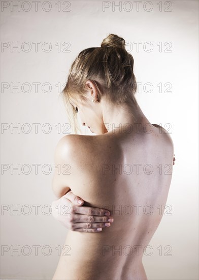 Bare back of a young woman