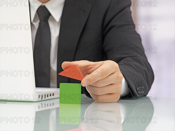 Businessman in an office with a laptop