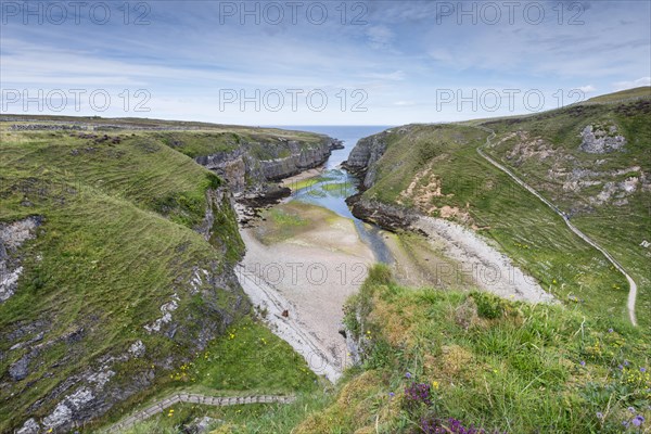 View seen from the viewpoint above Smoo Cave in the nearly 800m long Geodha Smoo fjord