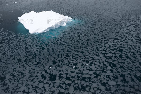 Iceberg surrounded by slush