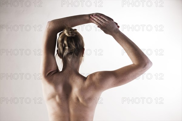 Bare back of a young woman