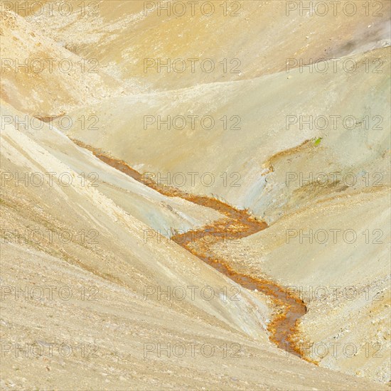 Stream bed coloured by iron oxide