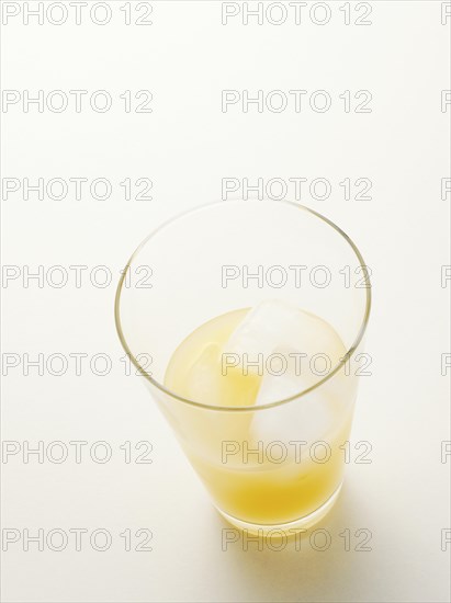 Glass of Pernod with ice cubes