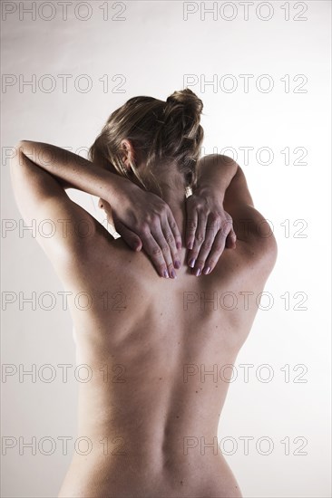 Bare back of a young woman