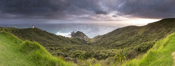 Lighthouse at the north-westernmost point of New Zealand at sunrise