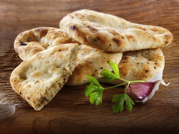 Indian naan bread with garlic and coriander