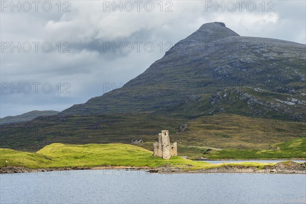 Ruins of Ardvreck Castle on a peninsula in the lake of Loch Assynt