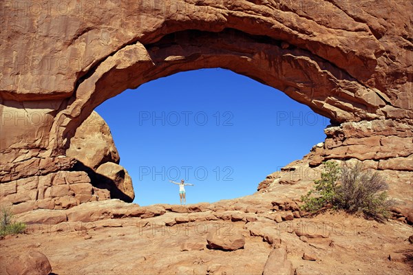 Girl standing in North Window Arch