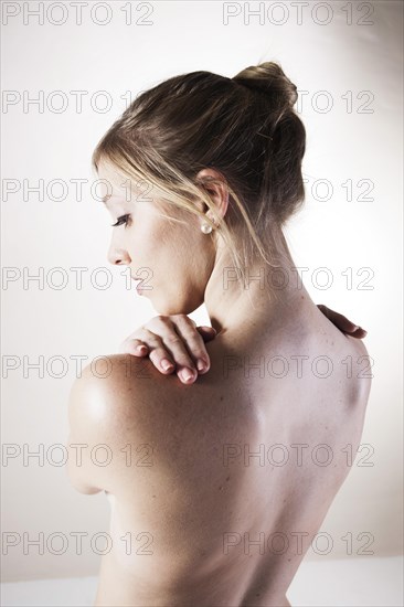 Bare back of a young woman