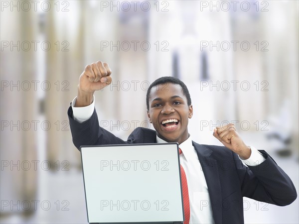 Businessman using a laptop in an office