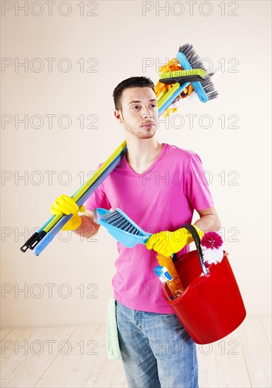 Man with cleaning supplies