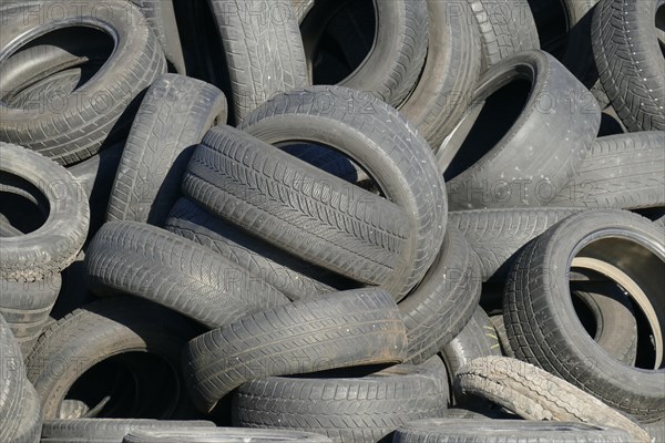 Old car tires in a heap