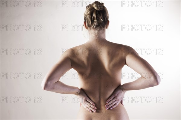 Bare back of a young woman