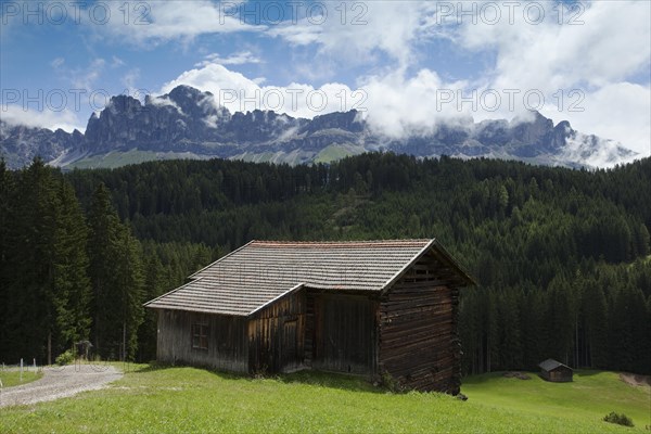Mountain hut with Latemar Mountain